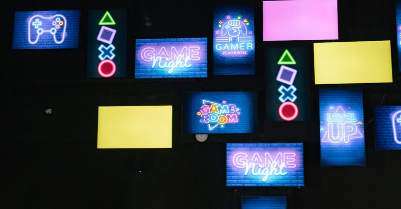 Gaming Industry - Lighted Screen Monitors Inside a Gaming Computer Shop