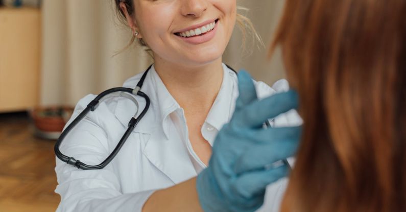 Vaccinations - A Woman in White Long Sleeve Shirt Smiling