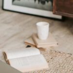 Alzheimer's Research - Laptop and books on floor carpet