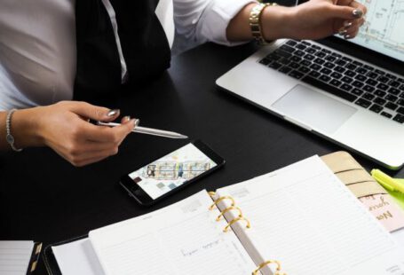 Estate Planning - Person Pointing on the Screen of a Laptop