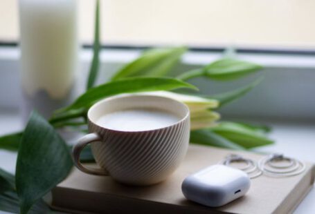 CRISPR Technology - A cup of coffee and a book on a window sill