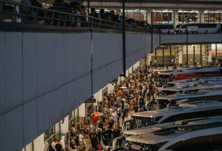 Coaches - A crowded bus station with many people waiting