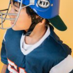 Player Safety - Ethnic boy wearing sportswear of American football player