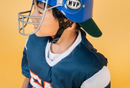 Player Safety - Ethnic boy wearing sportswear of American football player