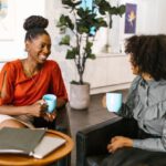 Business Leaders - Women Sitting on the Chair while Having Conversation